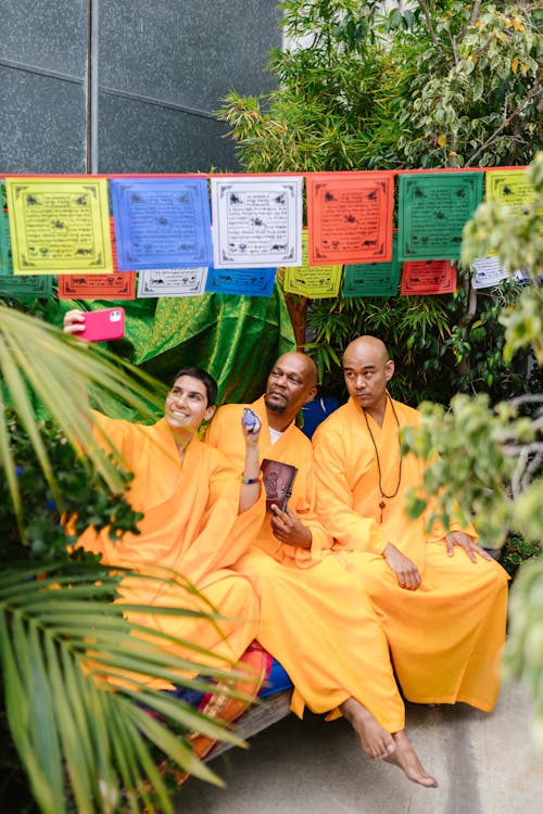 Monks Sitting in a Garden