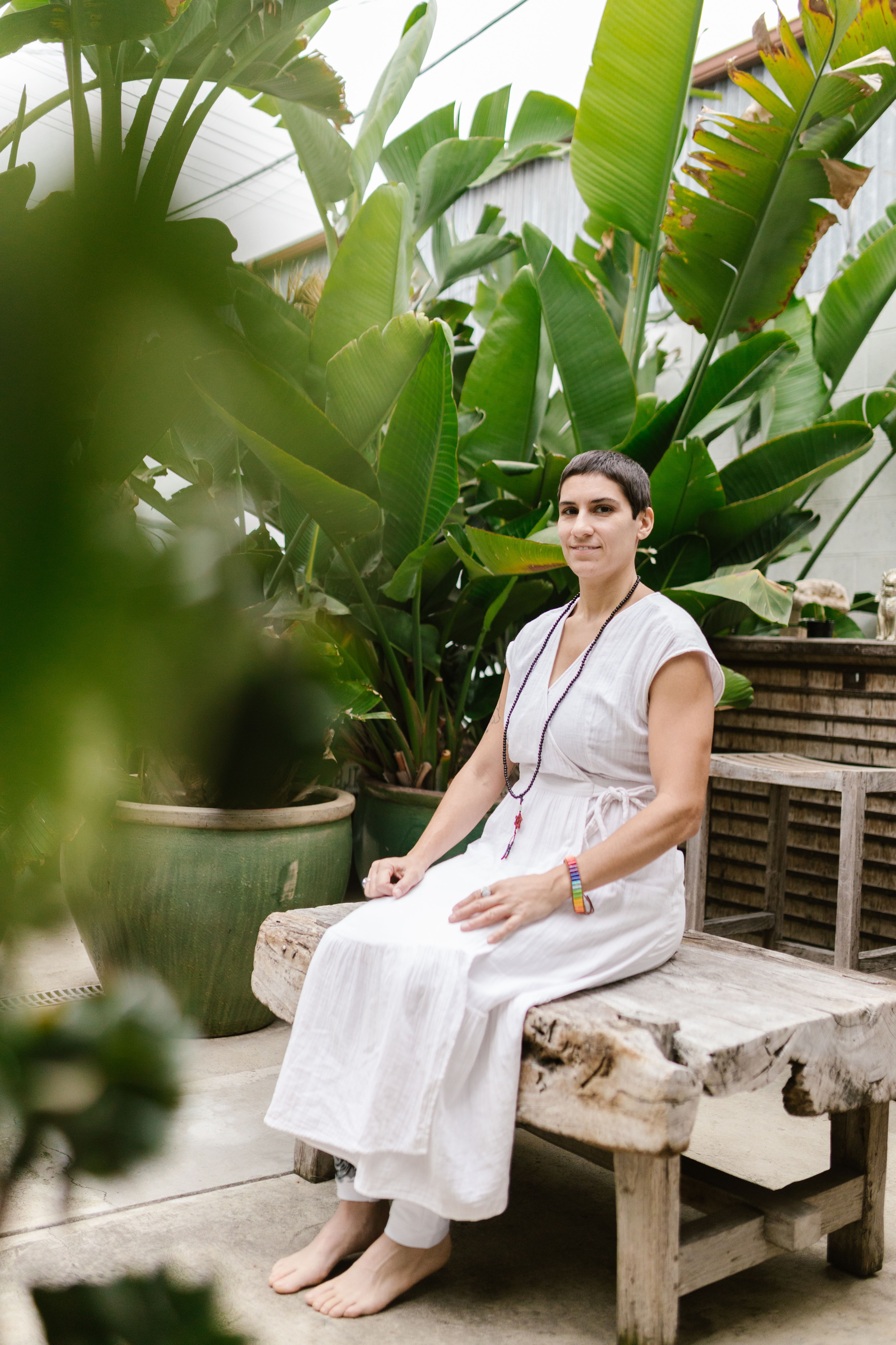 A Woman in White Dress Sitting on Wooden Bench · Free Stock Photo