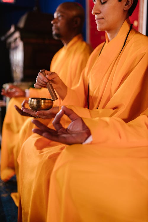 Monks Sitting in a Temple