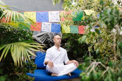 Free A Man Meditating in the Garden Stock Photo