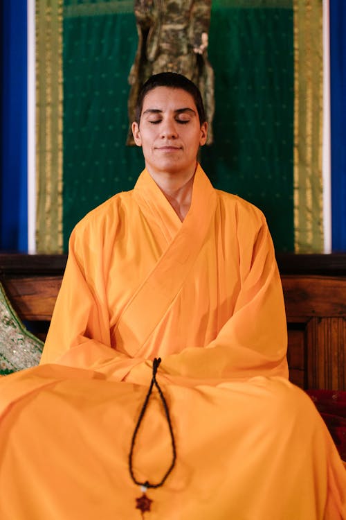 A Buddhist Praying with Eyes Closed