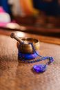 Blue and Silver Ring on Brown Textile