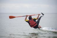 Man Falling from a Standup Paddleboard