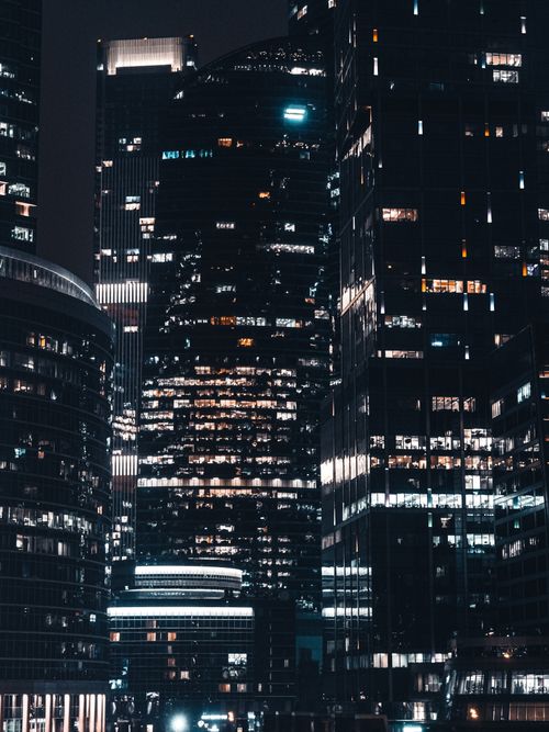 Free Night view of illuminated skyscrapers in Moscow City, Russia's bustling urban landscape. Stock Photo