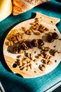 Close-Up Shot of Assorted Nuts on a Wooden Tray