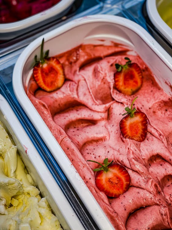 Close-Up Shot of Strawberry Ice Cream in a Container