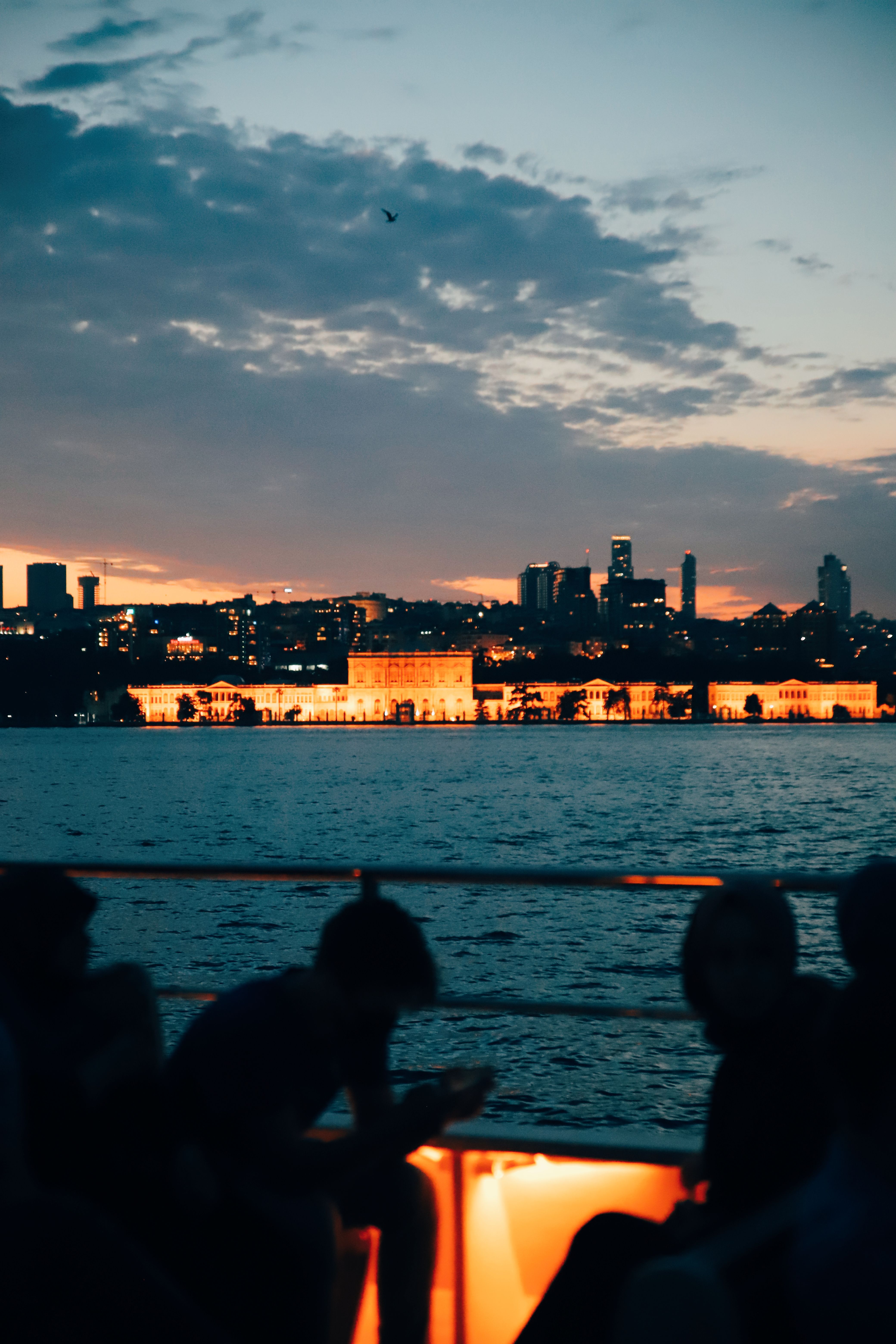 Silhouette of People Riding a Boat · Free Stock Photo