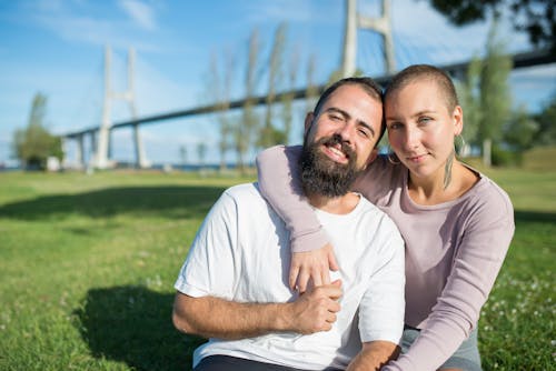 A Couple Smiling at the Camera