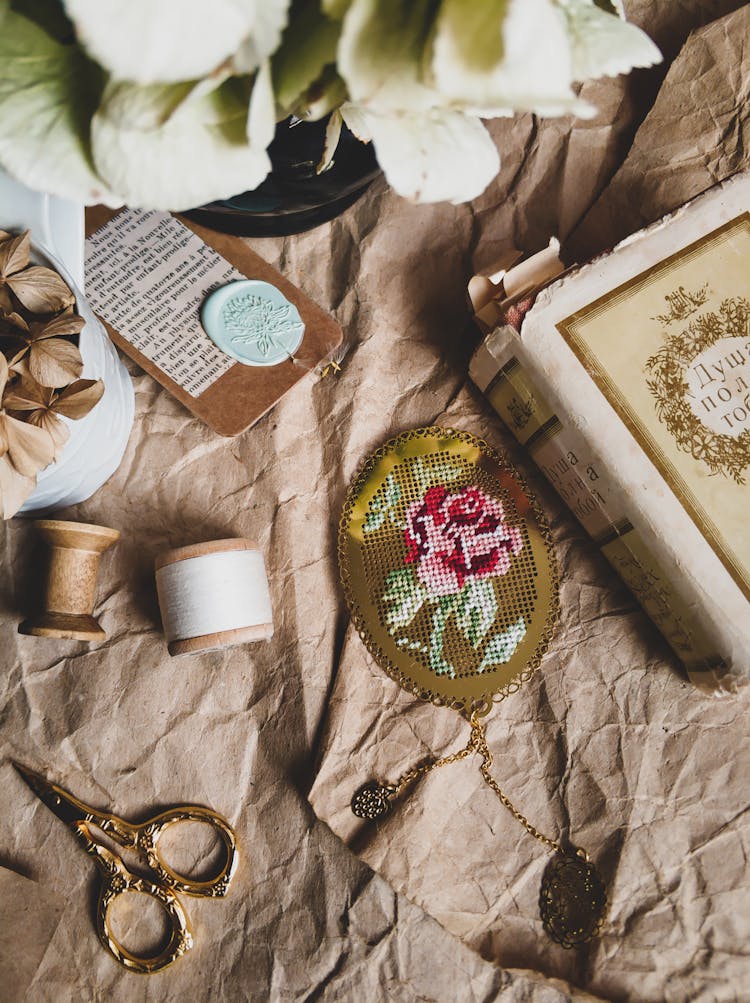 Antique Items Over Brown Paper