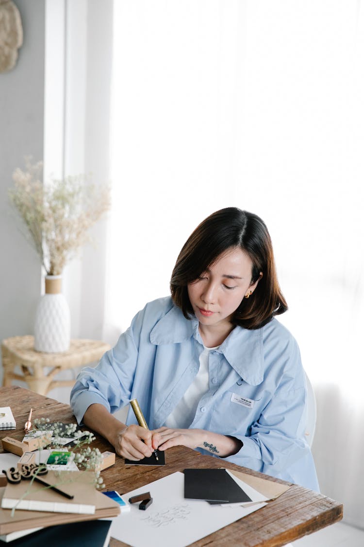 Woman Writing On Greeting Cards 