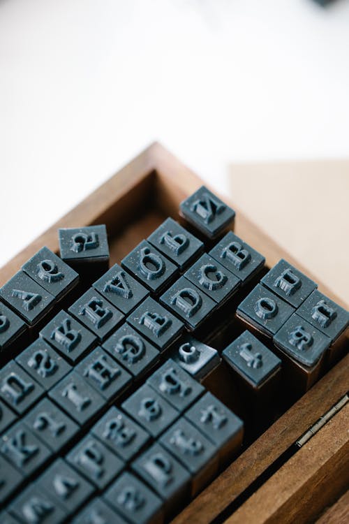 Free Black Computer Keyboard on Brown Wooden Table Stock Photo