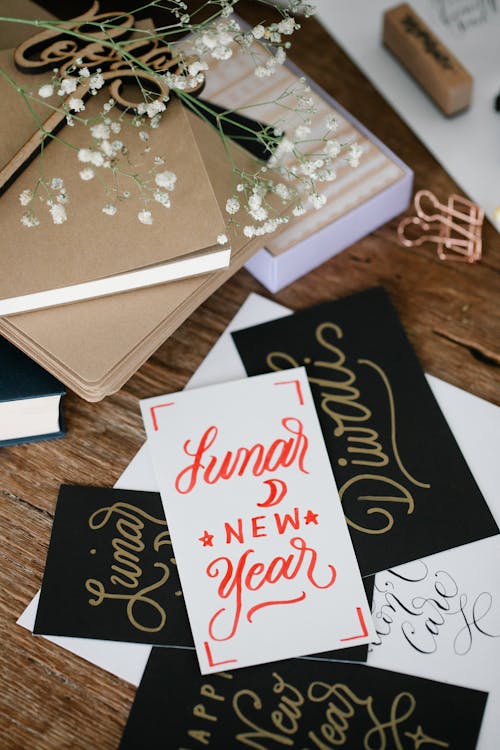 Free New Year's Card on Top of Other Cards Stock Photo
