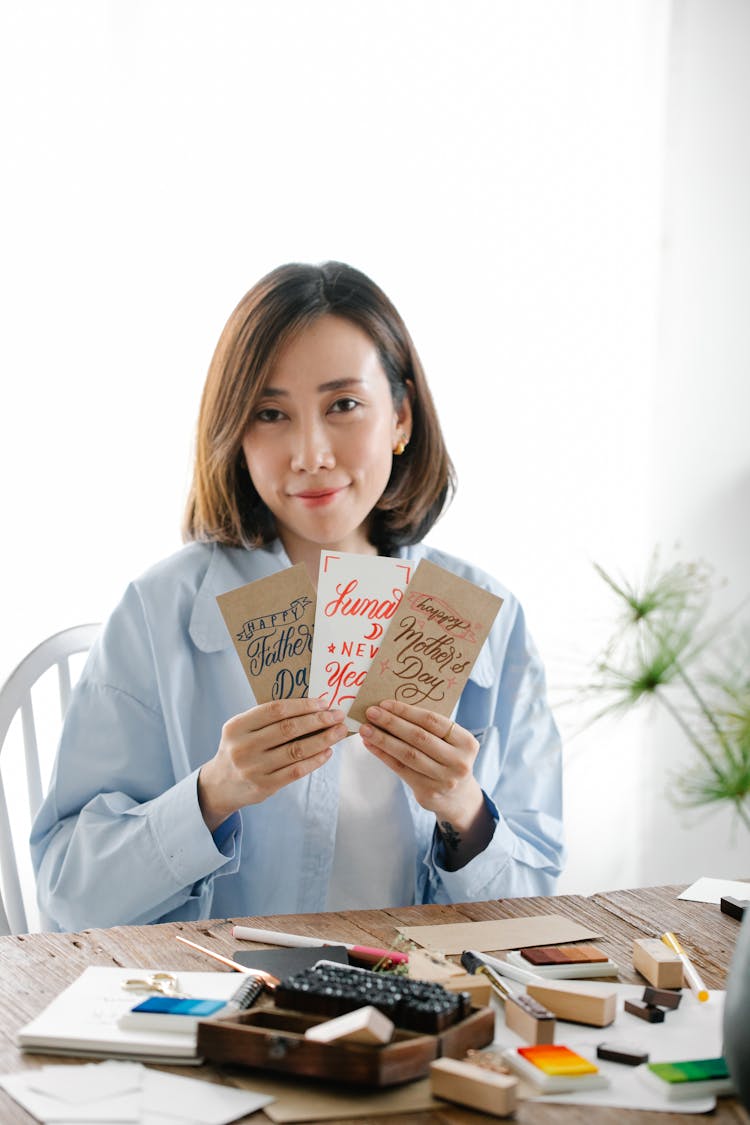 Beautiful Woman Holding Cards