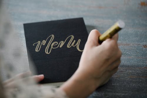 Close-up of Writing on a Cardboard