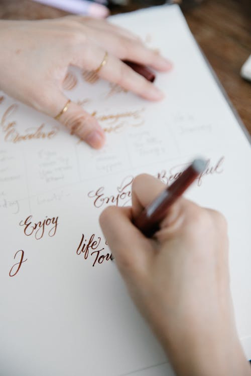Free Close-up of Writing on a White Paper Stock Photo