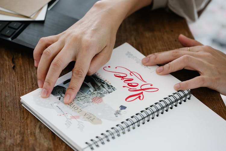 Woman Making A Scrap Book 