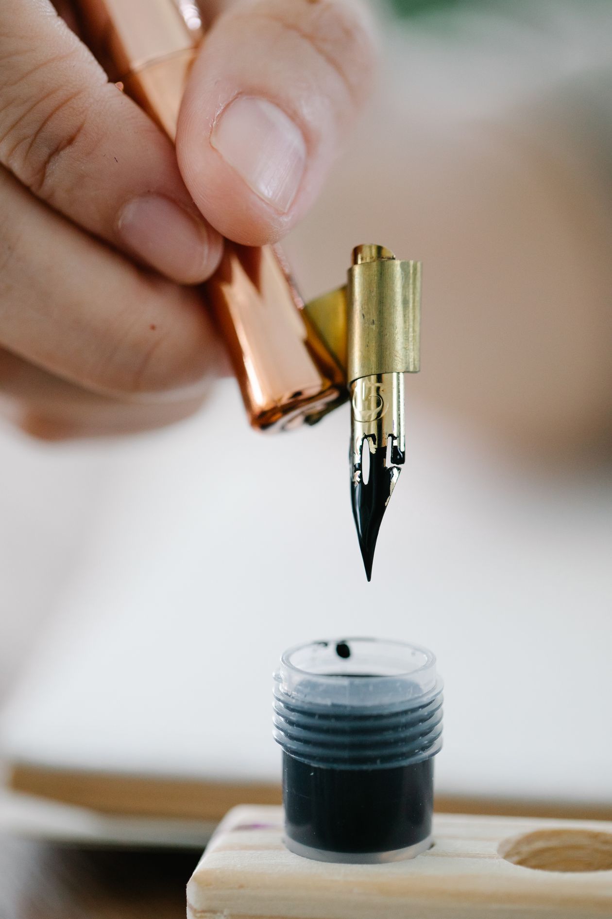 A fountain pen on a professional desk with paperwork — executive fountain pen setup