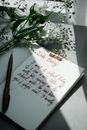 A Notebook with Cursive Texts