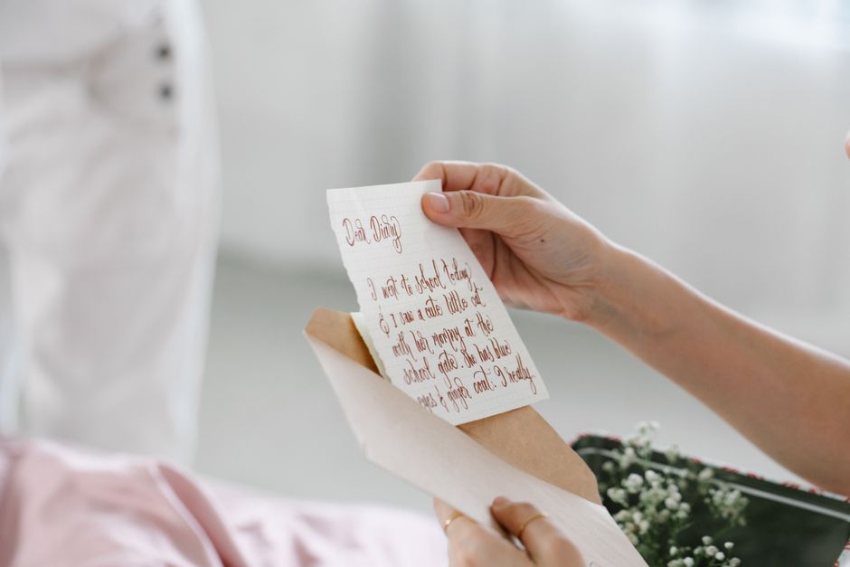 Handwritten personal note beside a small gift