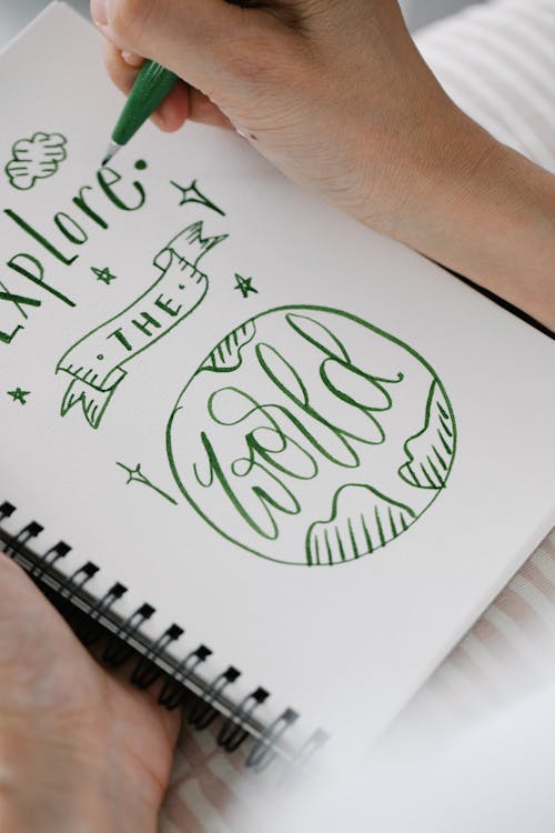 Kostnadsfri bild av anteckningsbok, grön, hand
