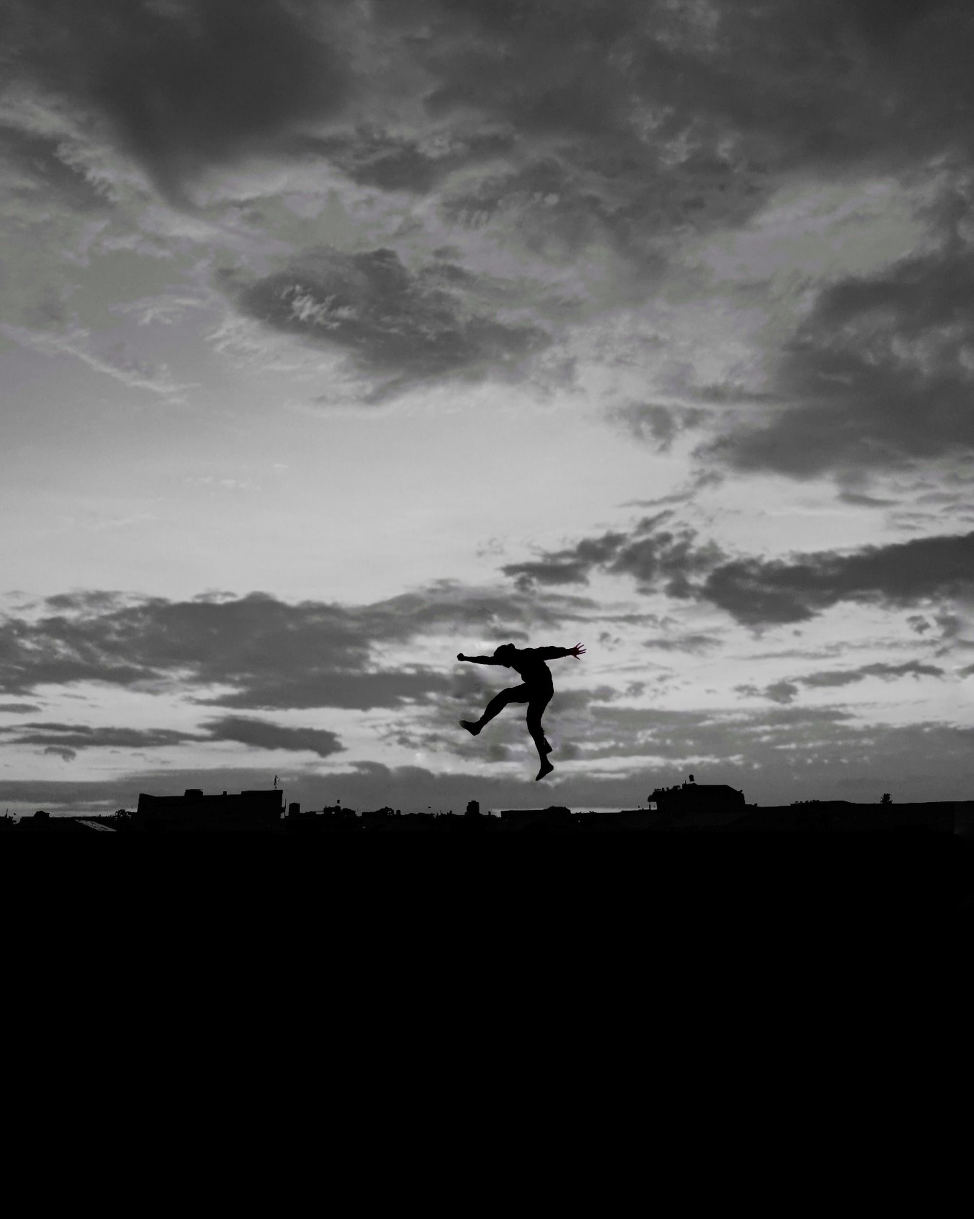 Monochrome Photo of Person Doing a Jump Shot · Free Stock Photo