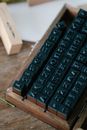 Alphabet Stamps on a Wooden Case