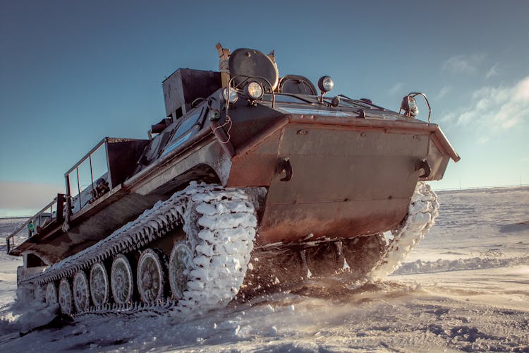 Heavy Military Vehicle On Snow