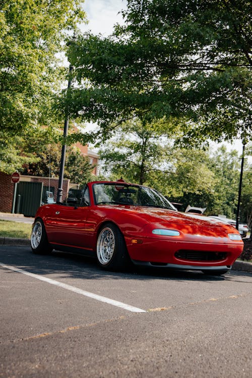 Red Convertible Car Parked on Parking Area