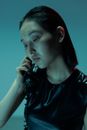 Woman in Black Top Holding Rotary Phone