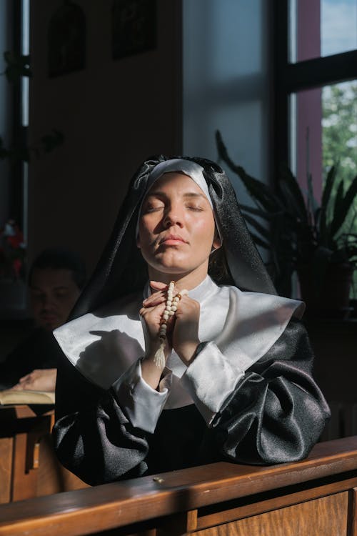 Free Devout Nun in Deep Thoughts Stock Photo