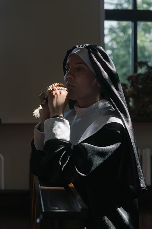 Devout Nun in Deep Thoughts