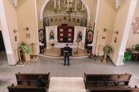 A Pastor Standing in Front of the Altar