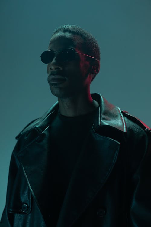 Man in Leather Jacket Wearing Sunglasses