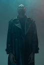 A Man in Leather Coat Looking Up