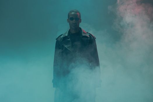 A dramatic portrait of a man in a leather jacket surrounded by smokey ambiance, exuding cyberpunk vibes.