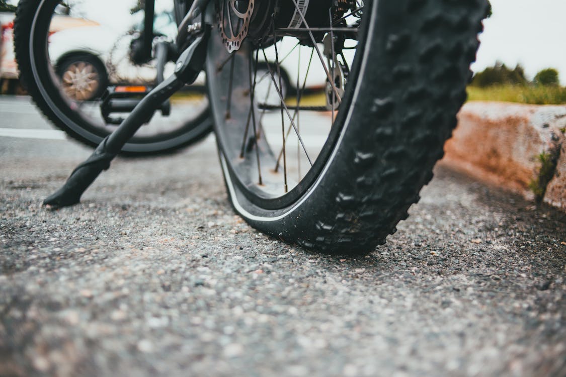 Free Flat Tire of a Motorcycle Stock Photo