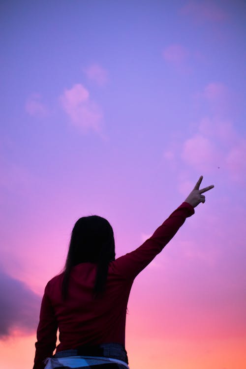 A Woman Raising Her Hand