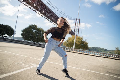 A Woman Dancing on the Street