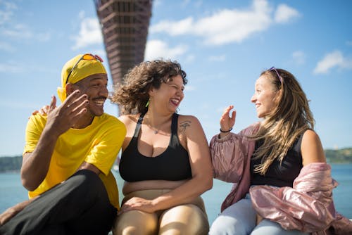 Free Friends Having a Fun Conversation Stock Photo