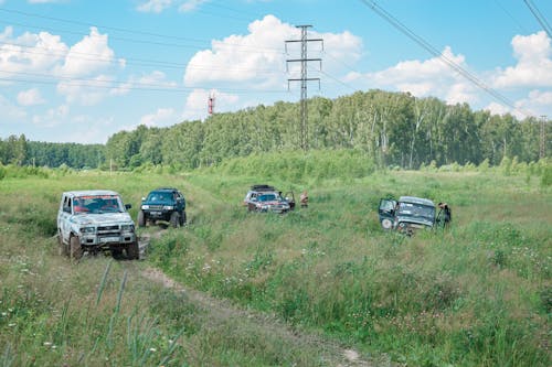 Vehicle Driving on Dirt Road