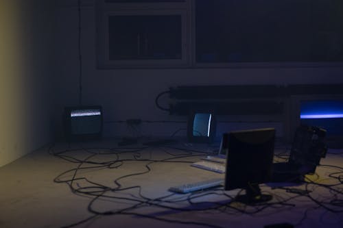 Old Computers in Dark Room