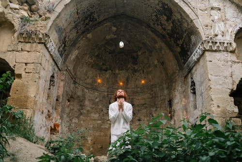 A Devoted Man Praying Solemnly