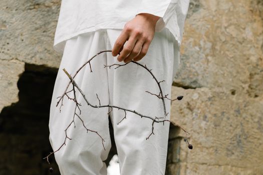 
A Person Holding Branches