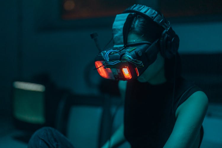 A Person Wearing Digital Goggles With Lights