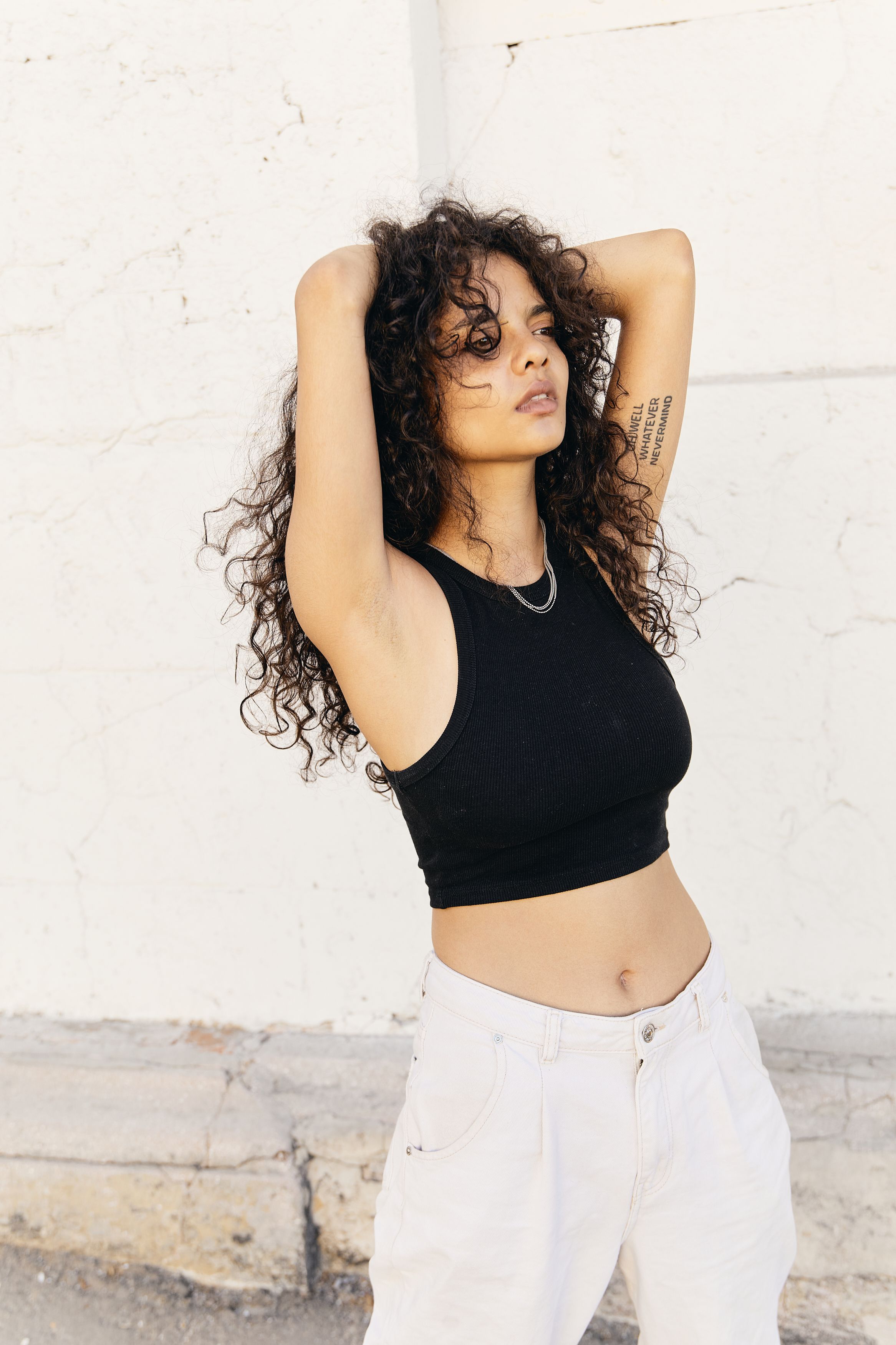 A Woman in Black Crop Top · Free Stock Photo