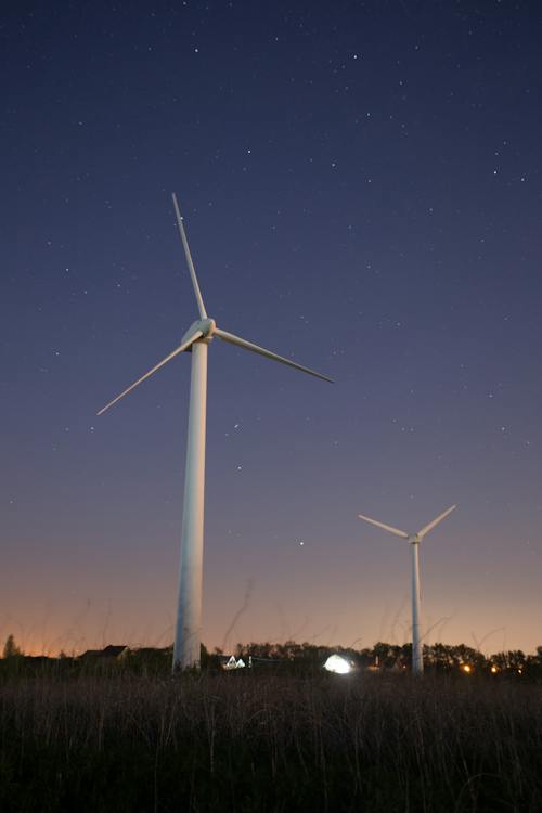 Windmills During Night Time 
