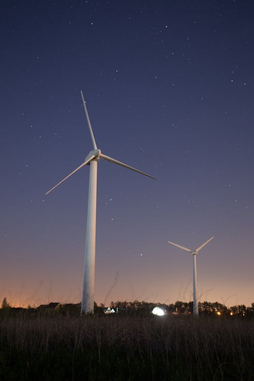 Windmills During Night Time 