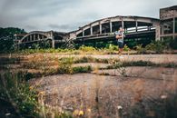 Man Standing Outside of the Aerodome Noytif in Russia