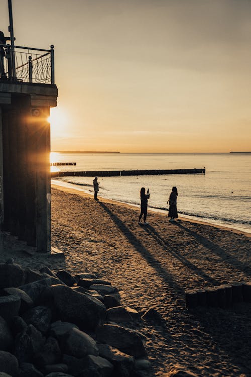 Fotobanka s bezplatnými fotkami na tému ľudia, more, piesok