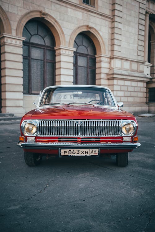 Foto profissional grátis de automobilístico, brilhante, carro vermelho